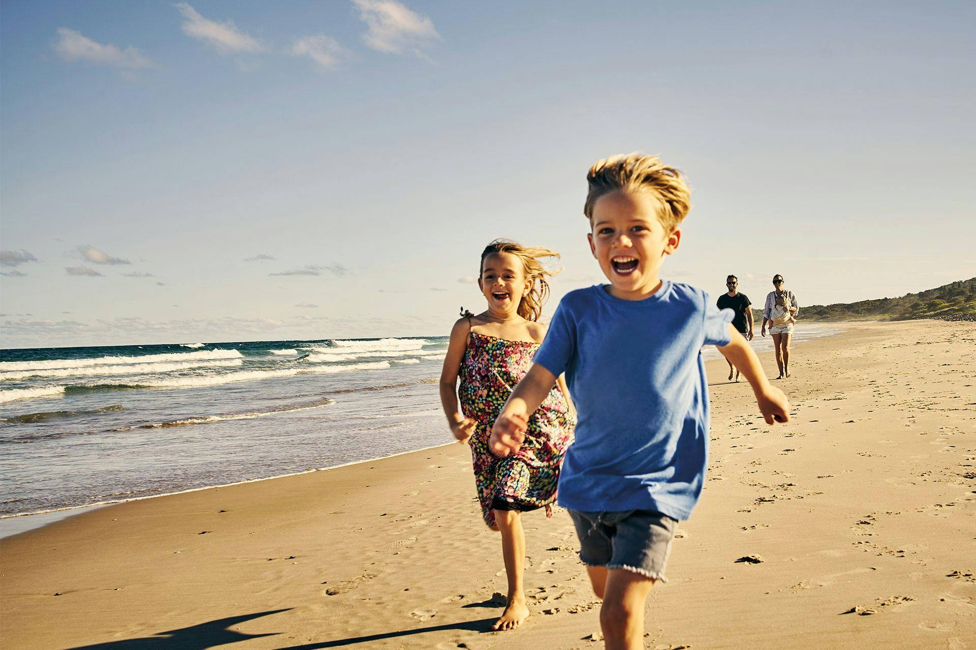 kids-running-on-a-beach