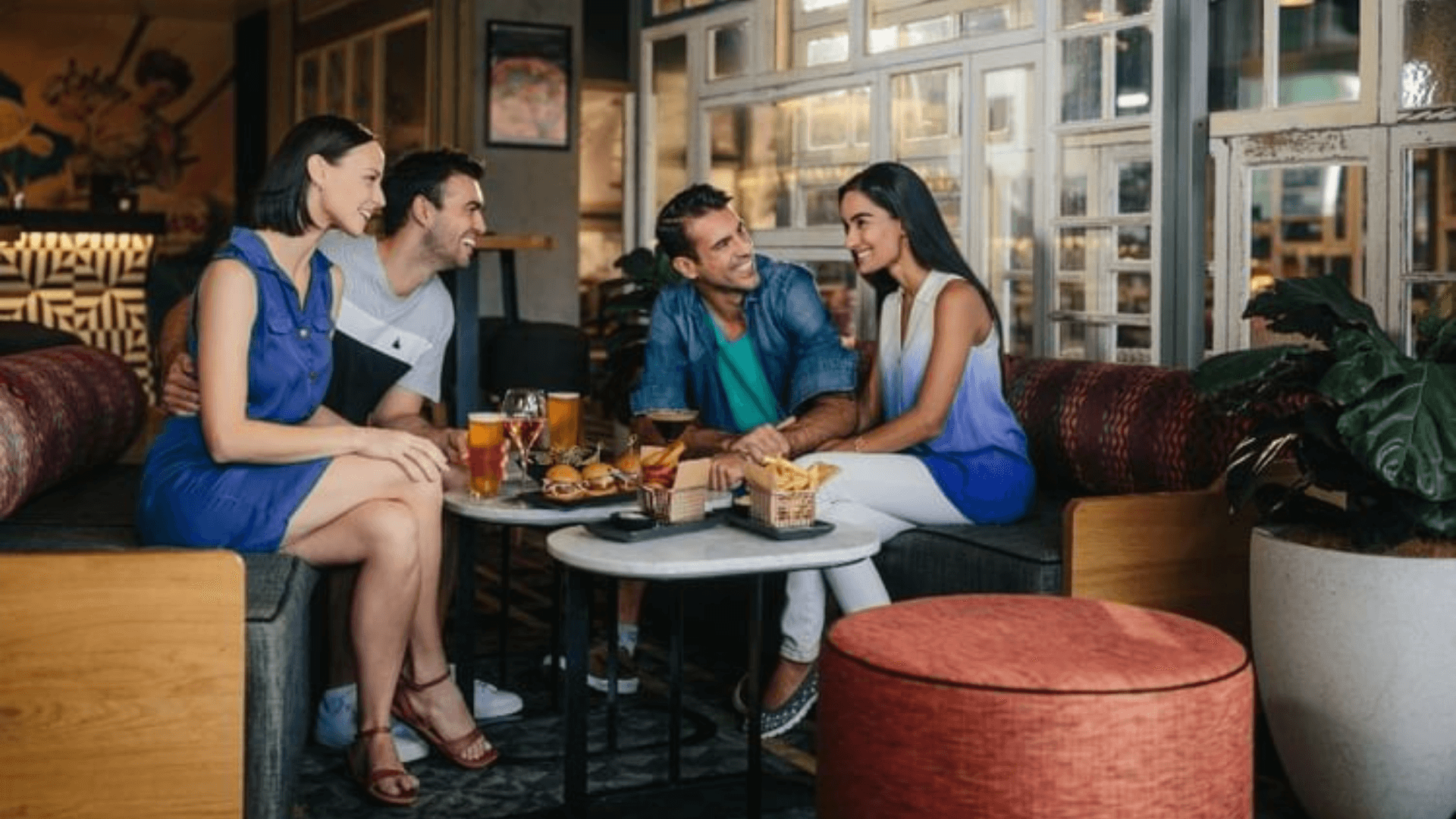 two-couples-enjoying-dinner-and-drinks-at-social-house